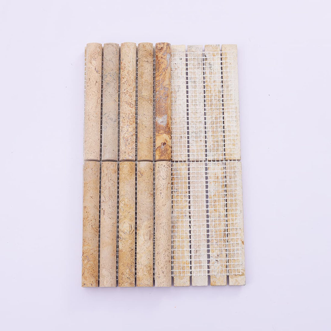 Back view of mesh-mounted beige travertine half-round strip mosaic sheet