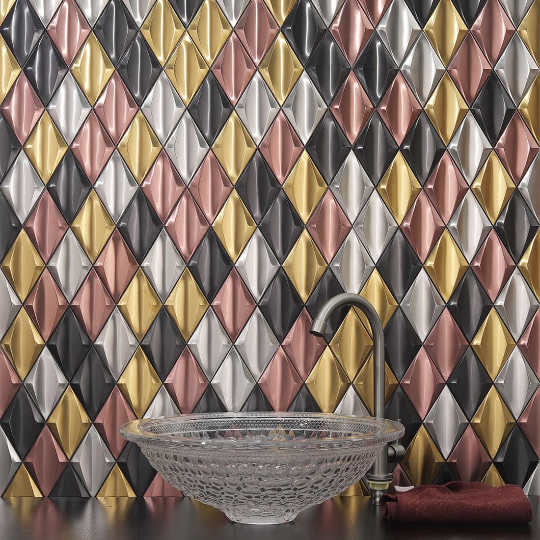 Mixed color diamond metal mosaic tile wall behind a bathroom sink