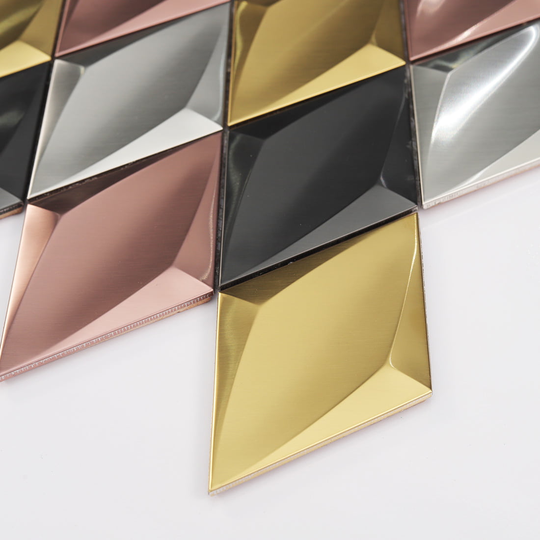 Angled view of mixed color diamond metal mosaic tile sheet edge