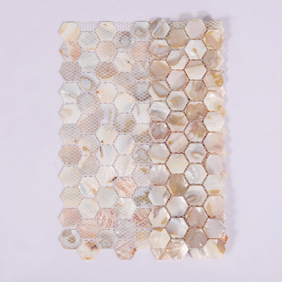 Front and mesh backing view of beige mother of pearl hexagon mosaic sheet