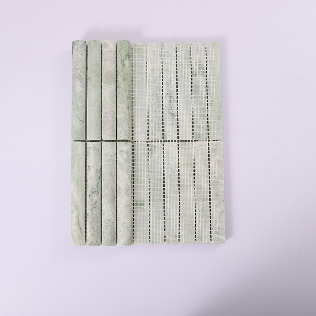 Front and mesh backing view of pale green marble half round mosaic tile