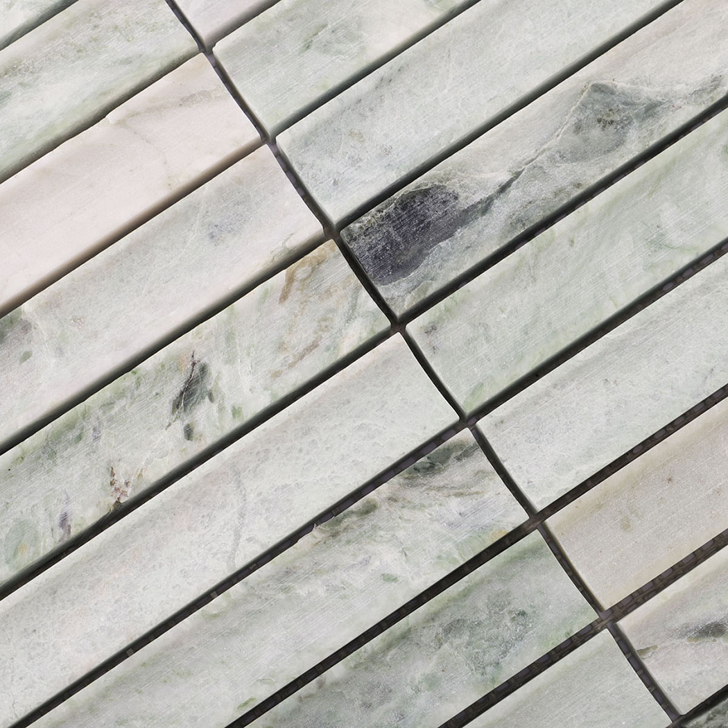 Pale green marble strips with sculpted concave ends and natural gray markings