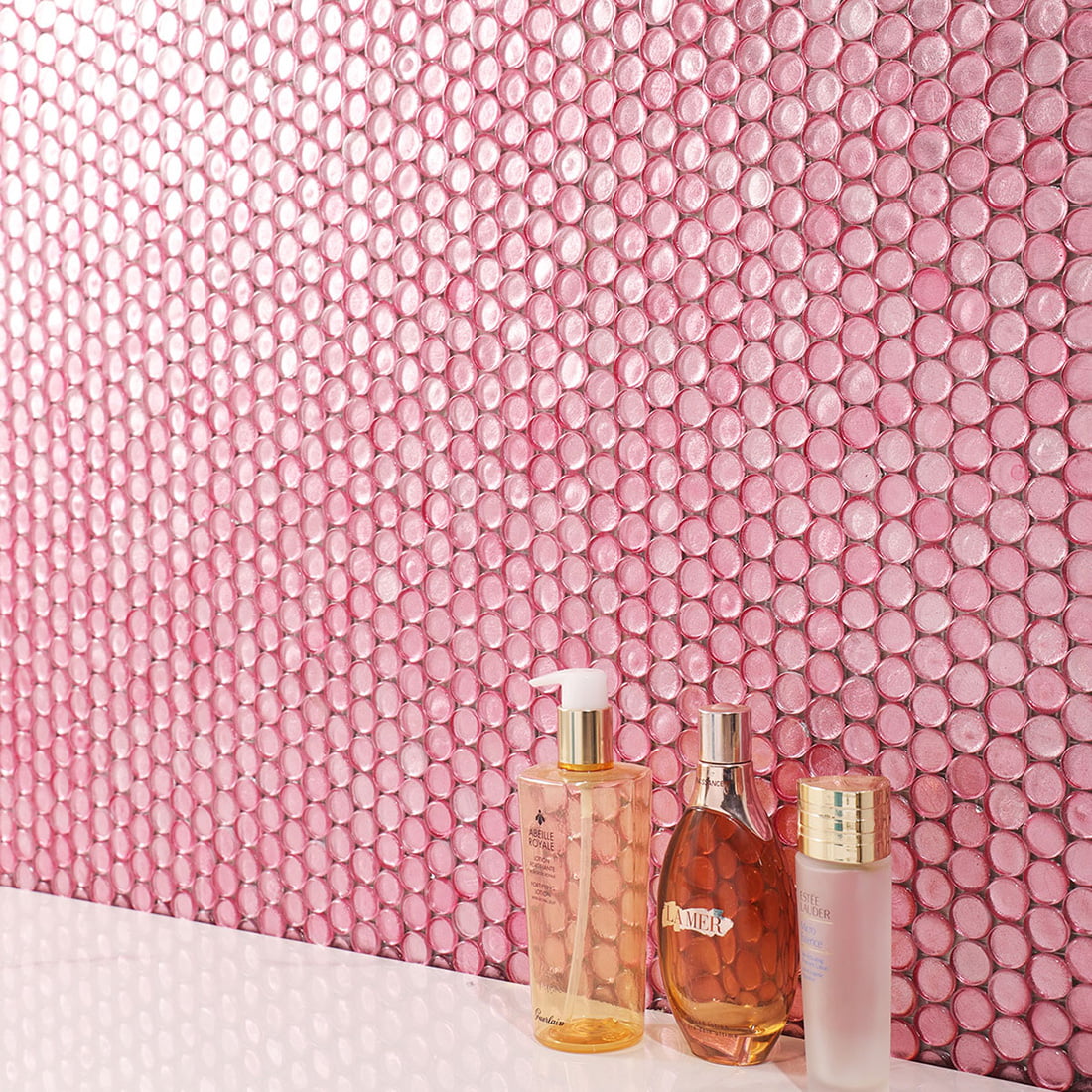 Pale pink round glass mosaic wall tile creating a soft and elegant interior look