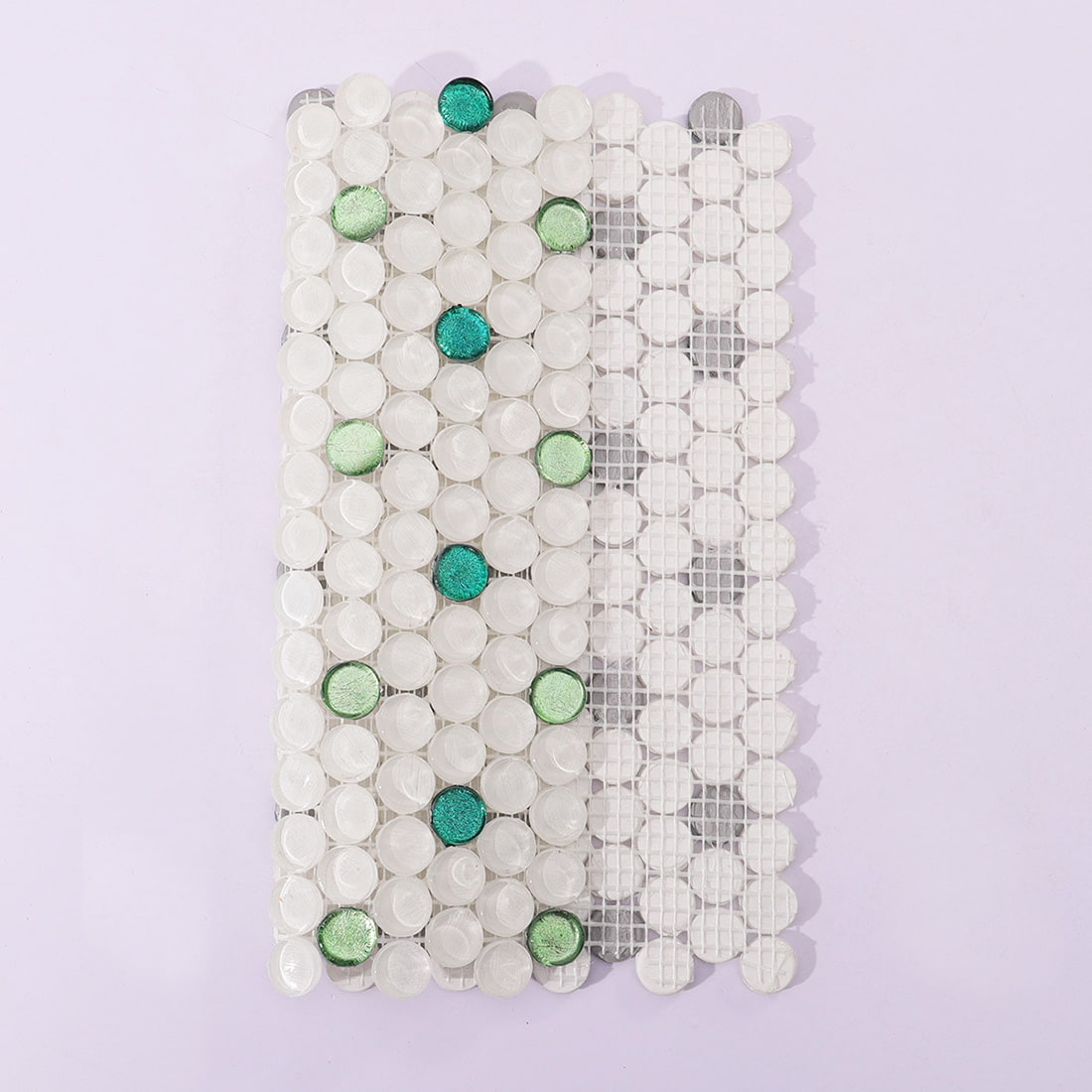 Back view of penny round glass mosaic tile showing fiber mesh backing