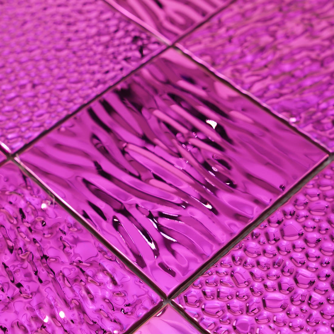 Pink wavy stainless steel mosaic tile with a glossy reflective finish