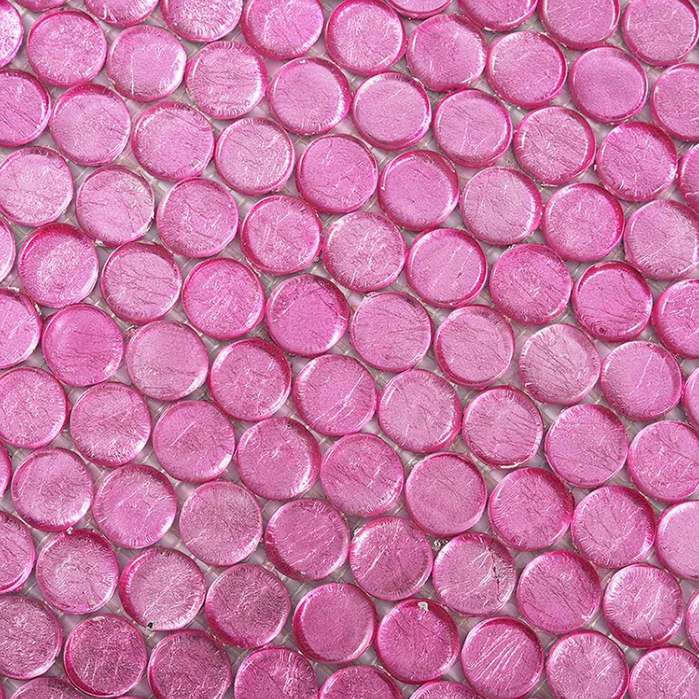 Close-up view of pink round glass mosaic tile surface and circular pattern