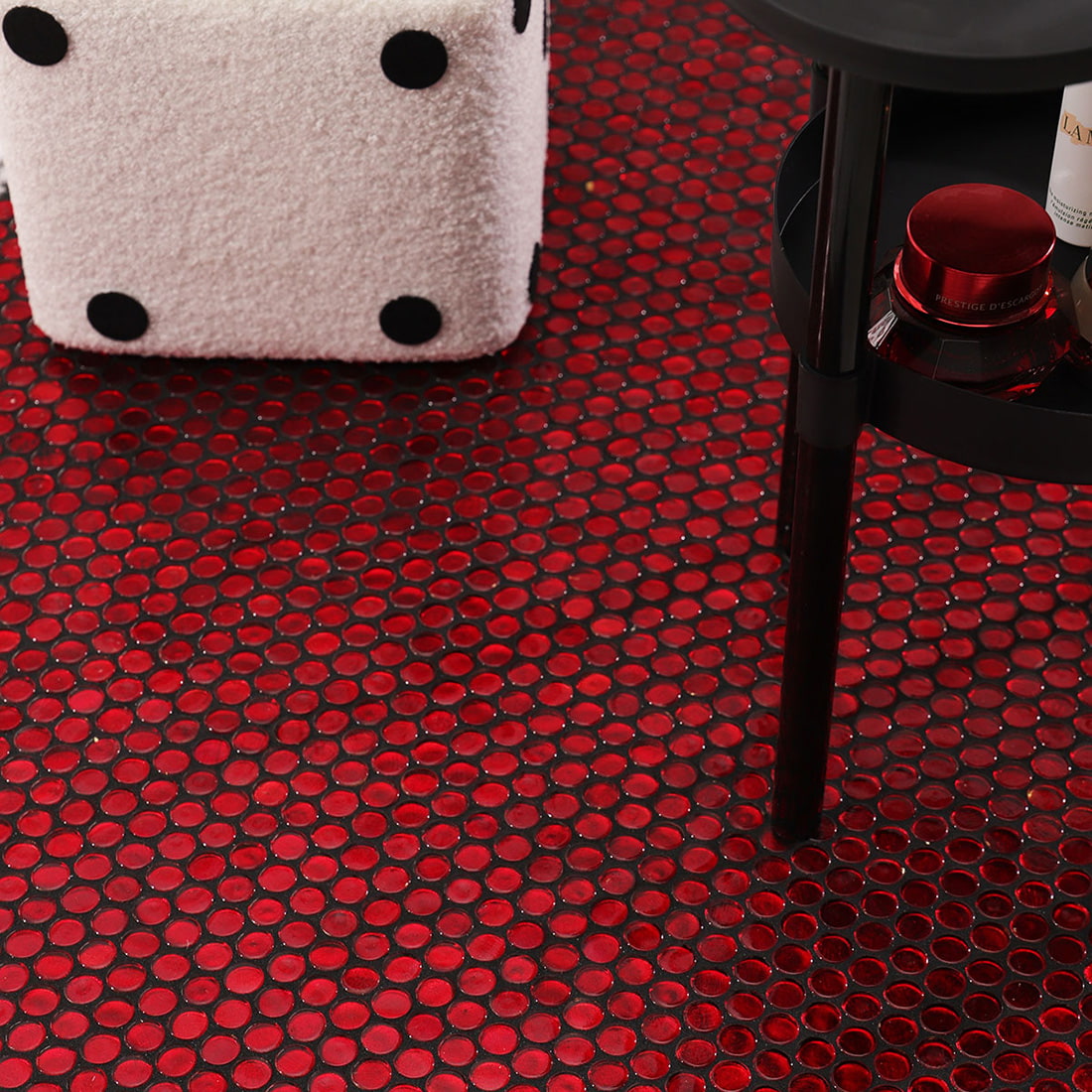 Red penny round glass mosaic floor styled with modern furniture elements