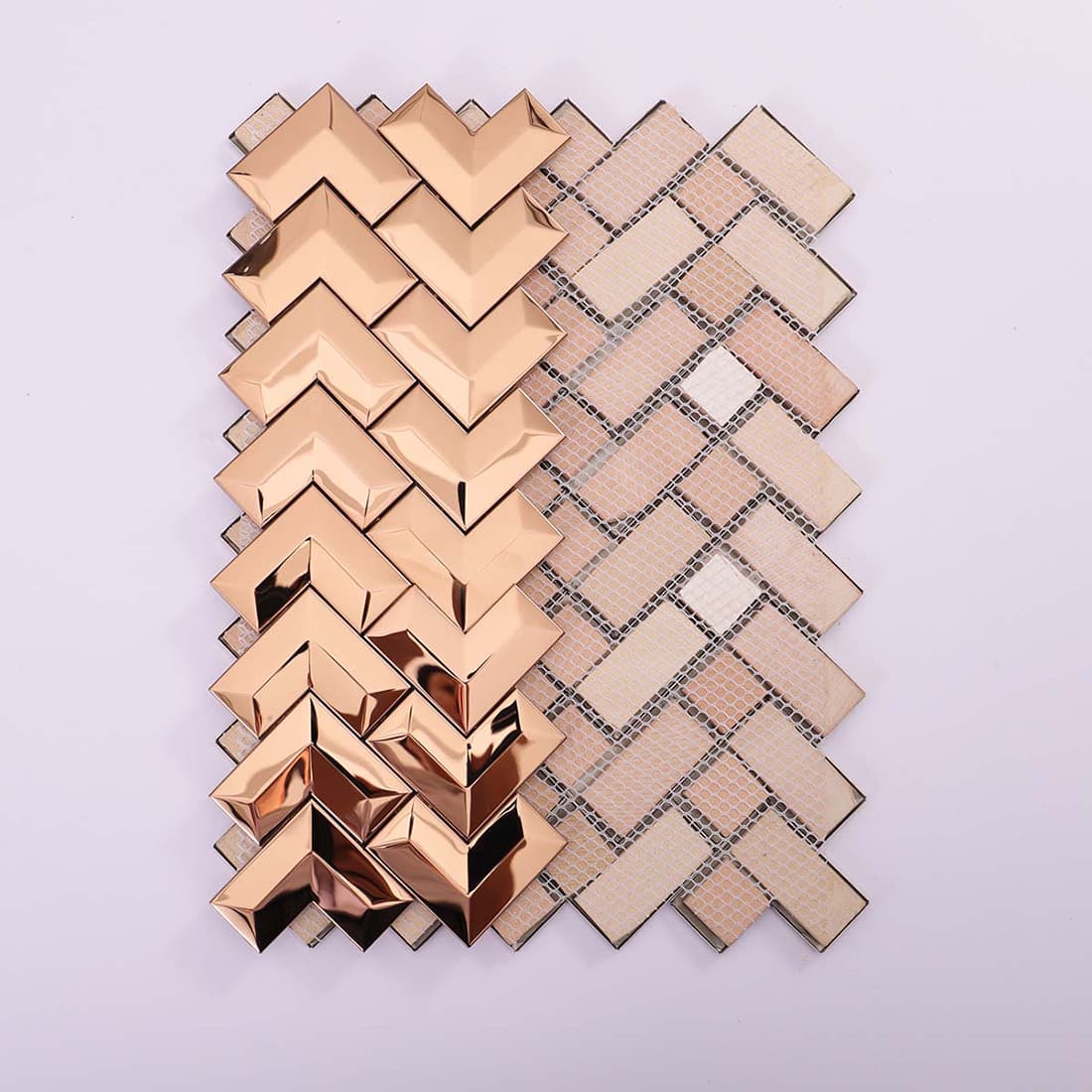 Back view of rose gold chevron metal tiles showing the white fiber mesh backing.