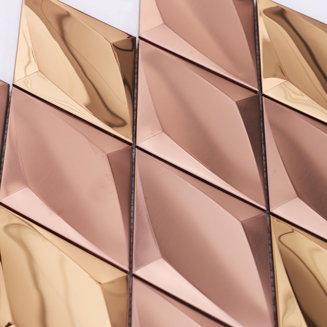 Rose gold diamond metal mosaic tile texture with brushed and polished finishes