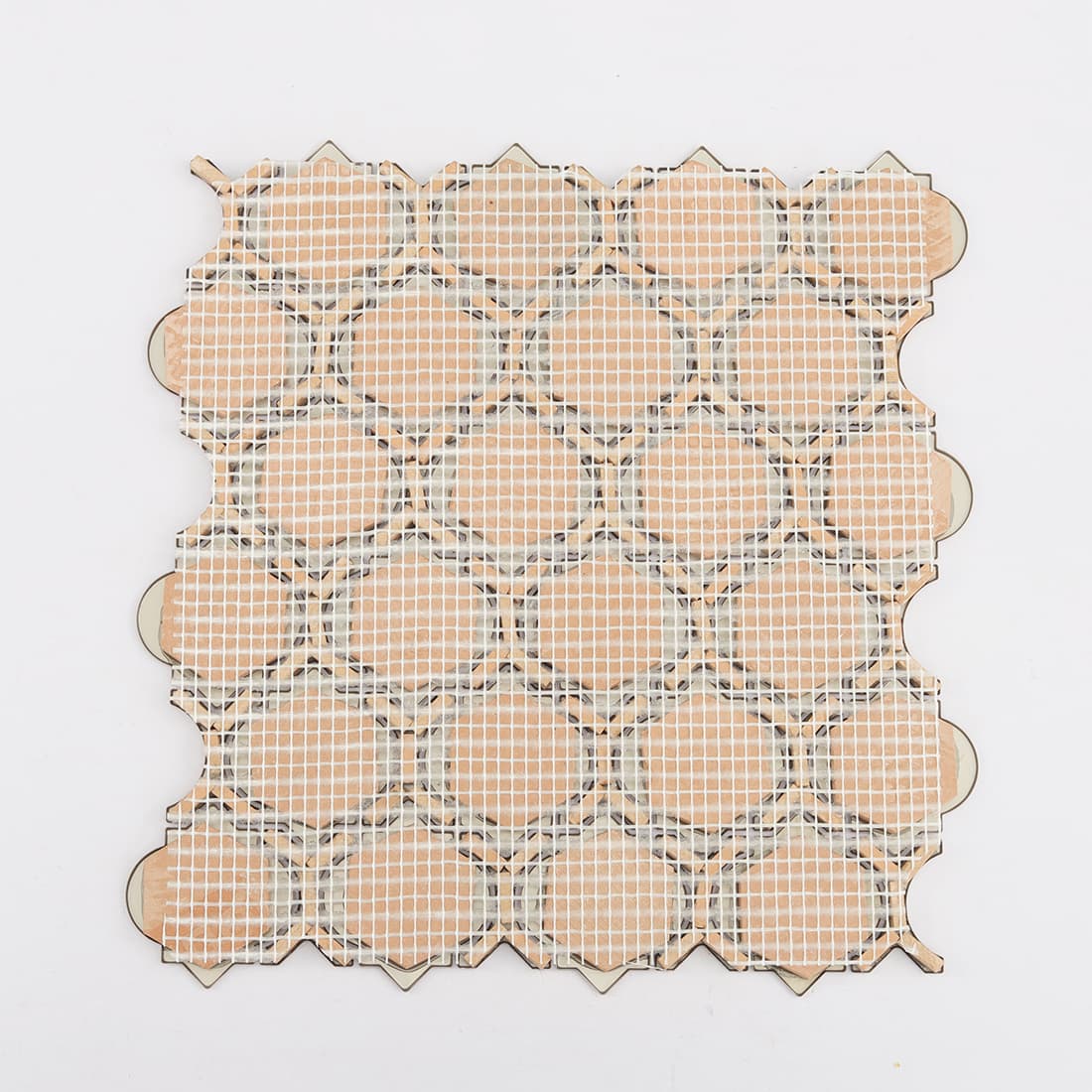 Back view of rose gold lantern mosaic tile with mesh mounted backing