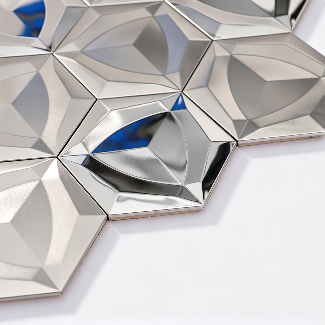Edge detail of silver 3D hexagon stainless steel mosaic tiles