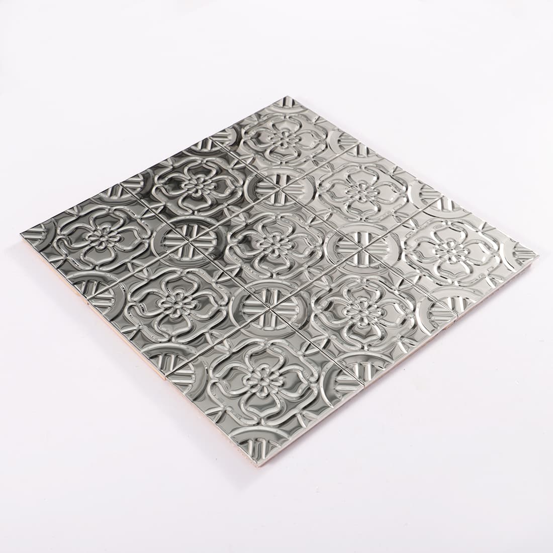 Top view of silver embossed floral mosaic tile sheet