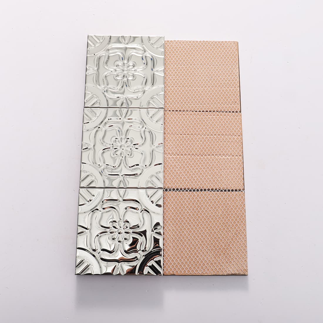 Silver floral mosaic tiles shown with front and back sides