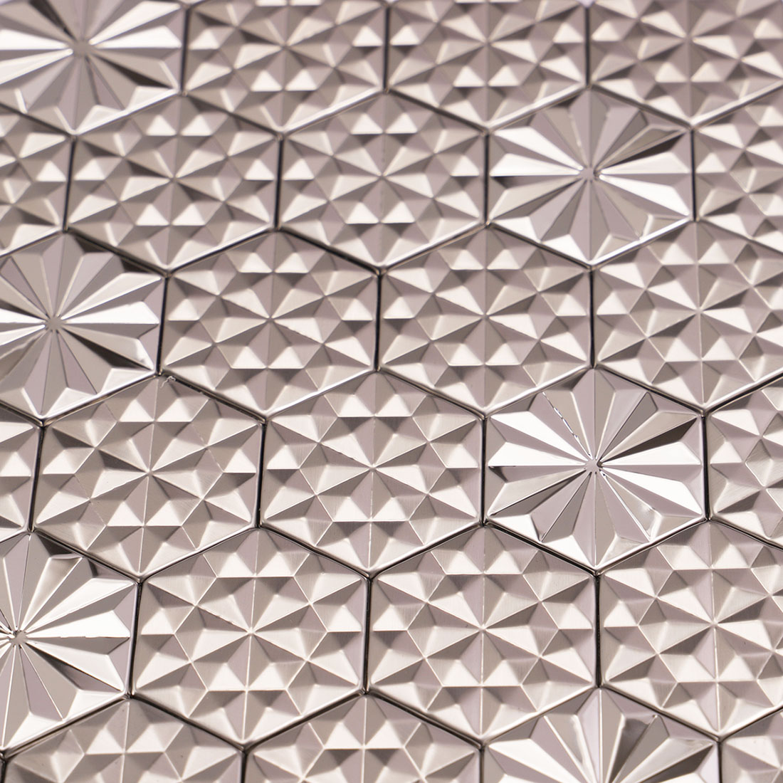 Close-up of silver geometric hexagon metal mosaic tile texture