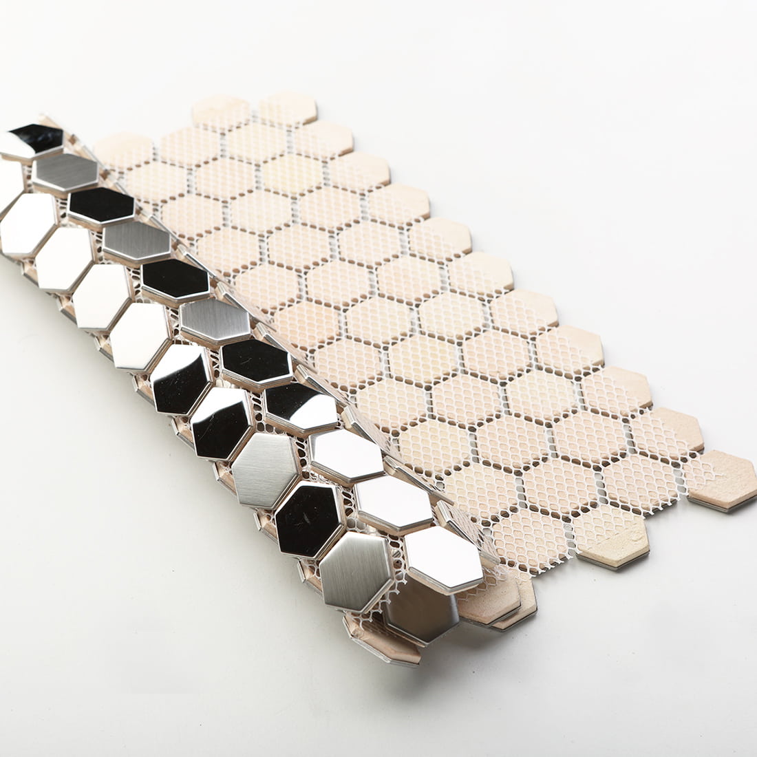 Front and back view of silver hexagon tiles showing the fiber mesh mounting