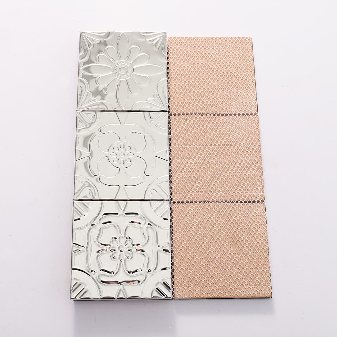 Silver floral embossed mosaic tile front and mesh backing view