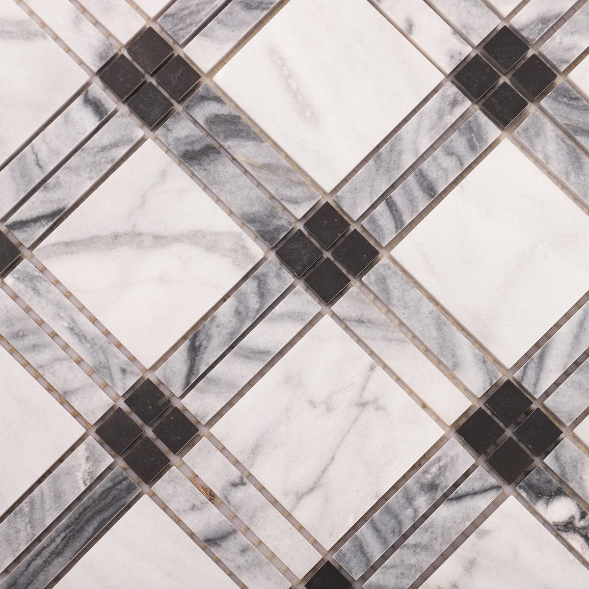 Close-up of gray marble liner grid crossing with black square dots and white marble fields.