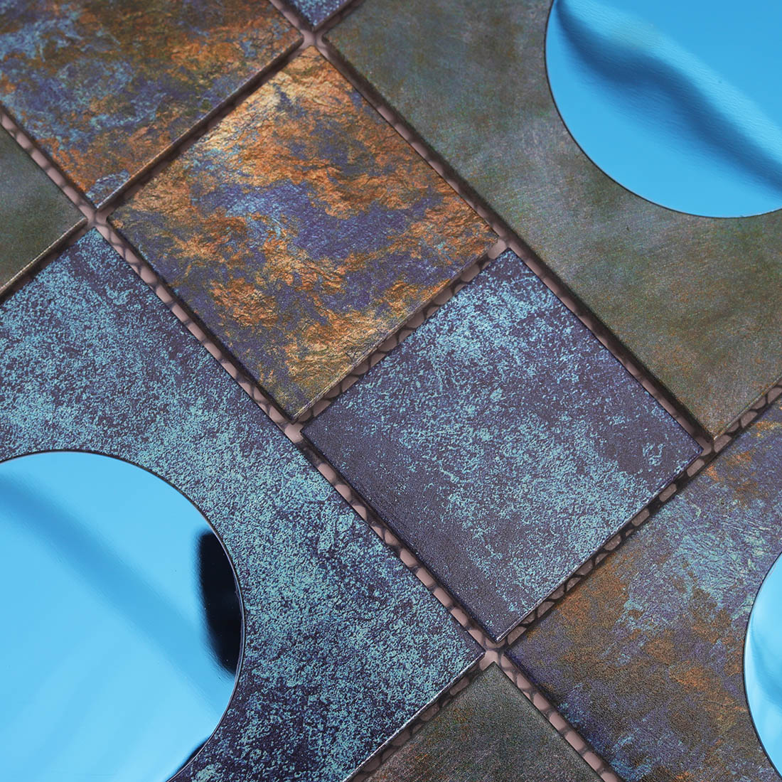 Textured blue black aluminum mosaic tile with round blue mirror accents