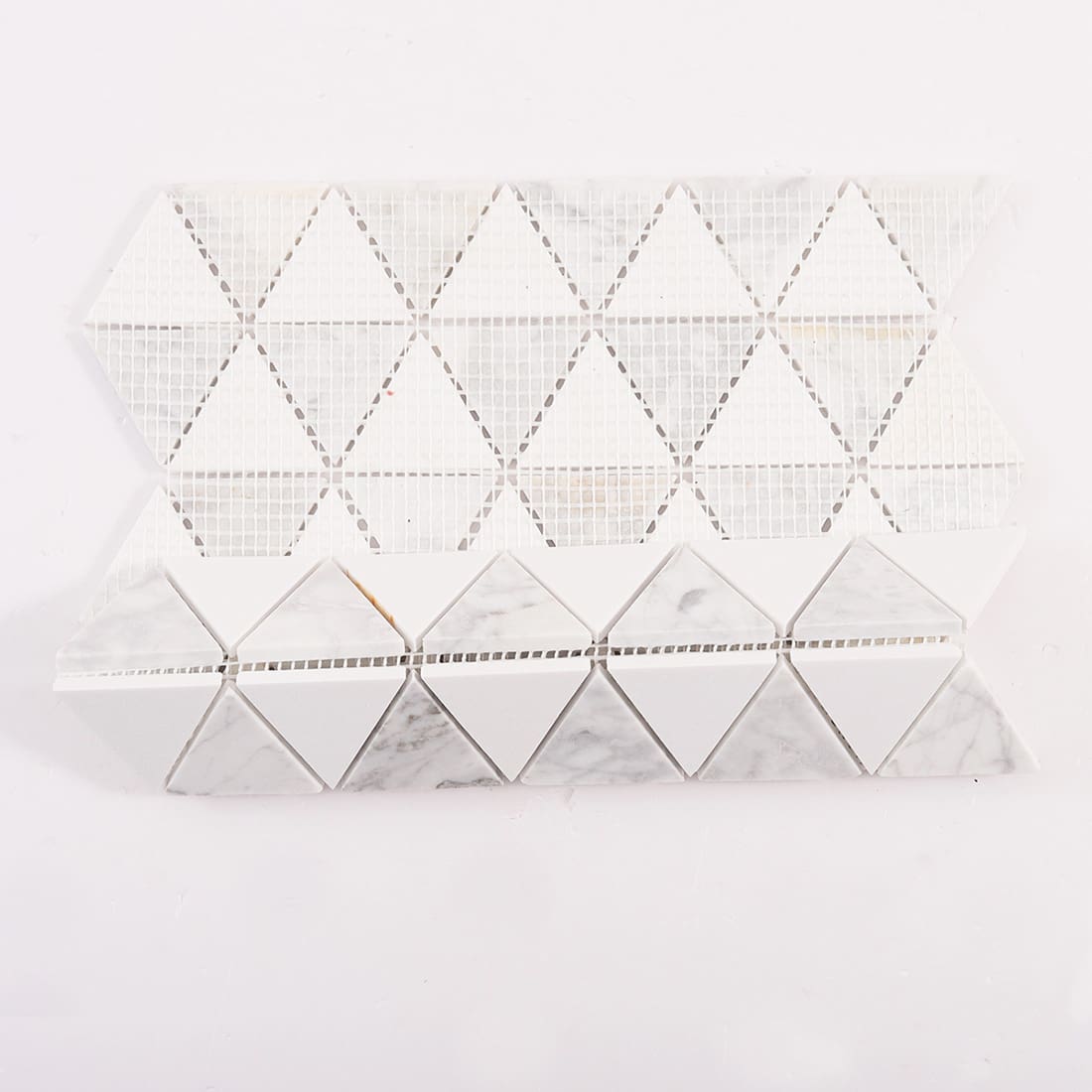 Mesh backed triangle mosaic tile sheet shown with side profile view