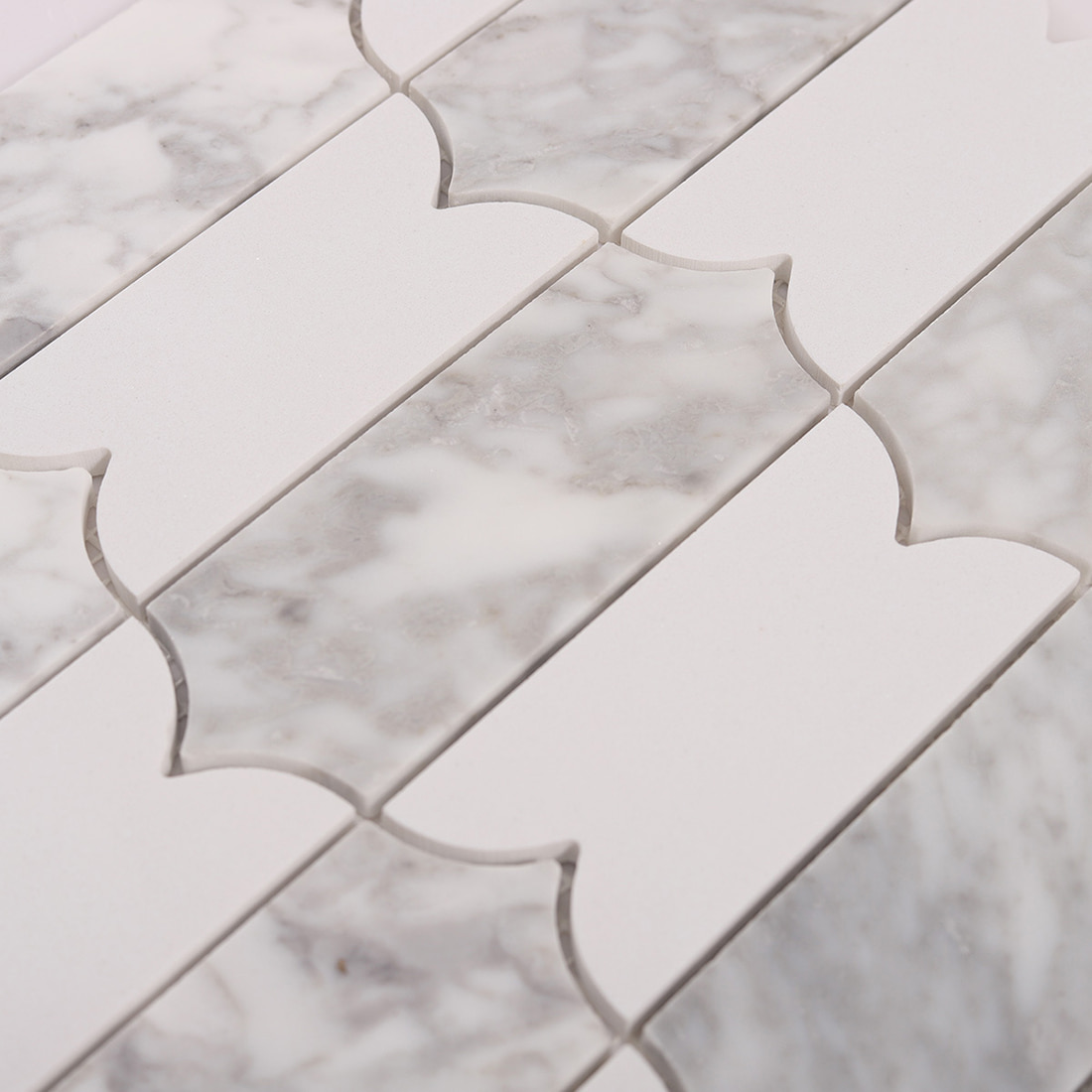 Close view of mixed white and gray marble lantern mosaic tiles