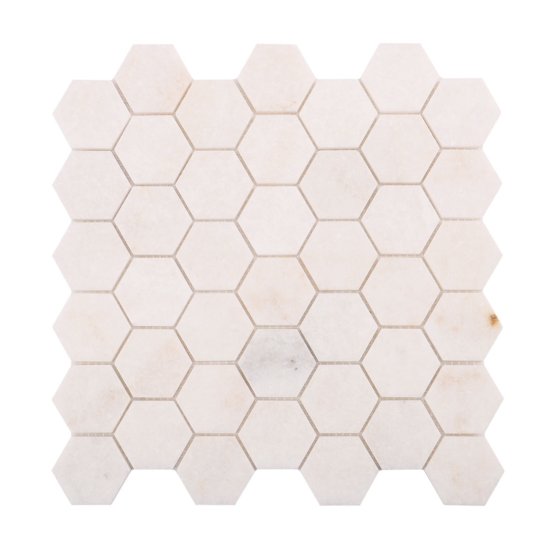 Top view of a white marble hexagon mosaic tile sheet.