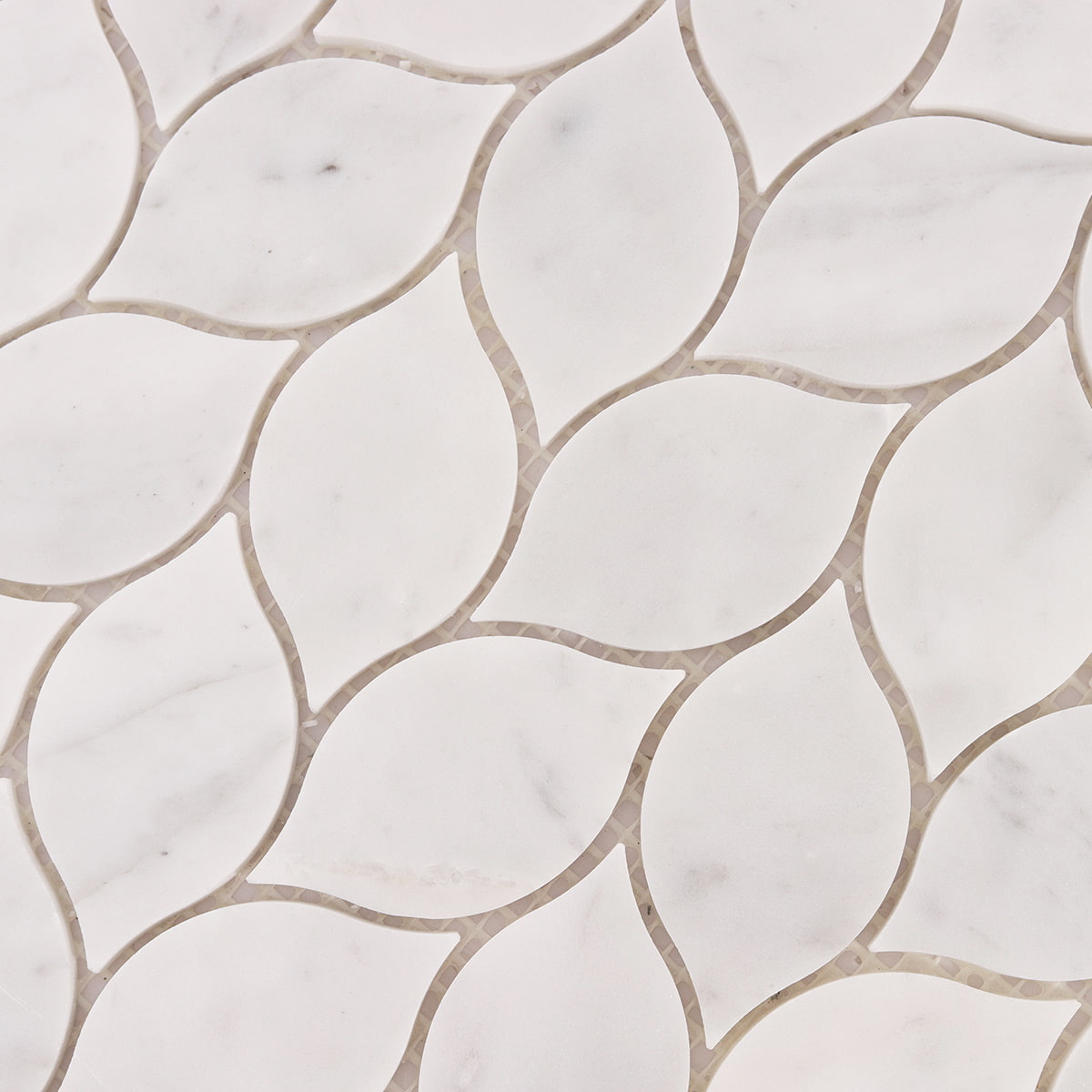 Top view detail of white marble leaf mosaic tile pattern