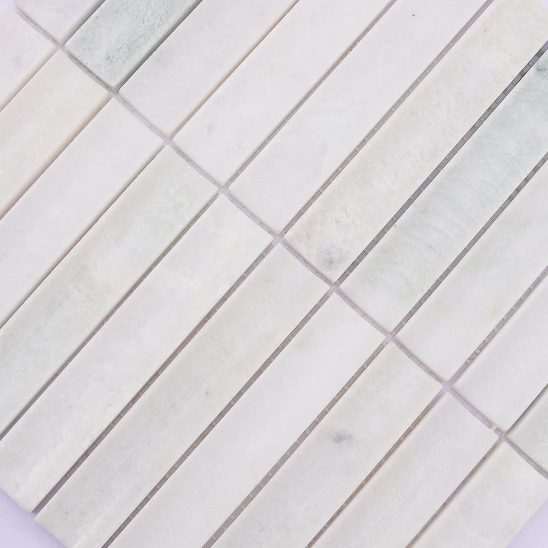 White marble vertical mosaic strips with light green and gray natural markings