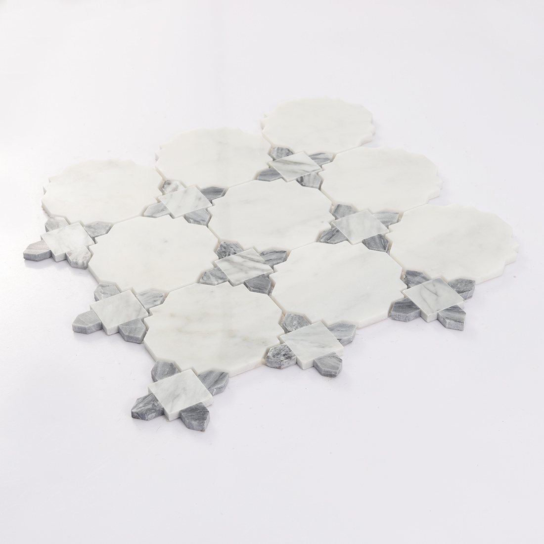 Side view of white octagon marble mosaic with gray decorative inserts