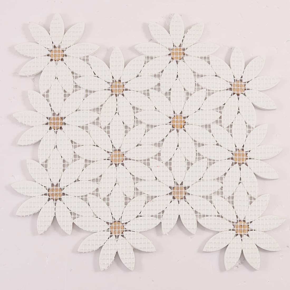 Back view of white daisy flower marble mosaic sheet with mesh backing