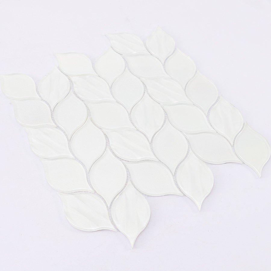 Angled close-up of white glass iridescent leaf mosaic tile sheet.