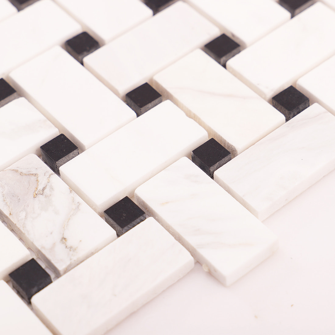 Angled close-up showing thickness and polished edges of basket weave mosaic.