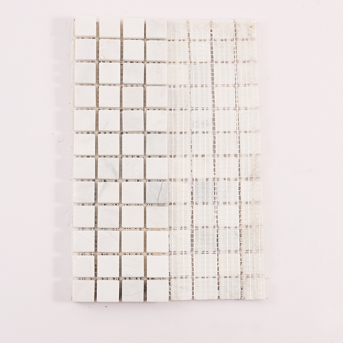 White marble square mosaic tiles mounted on fiberglass mesh backing