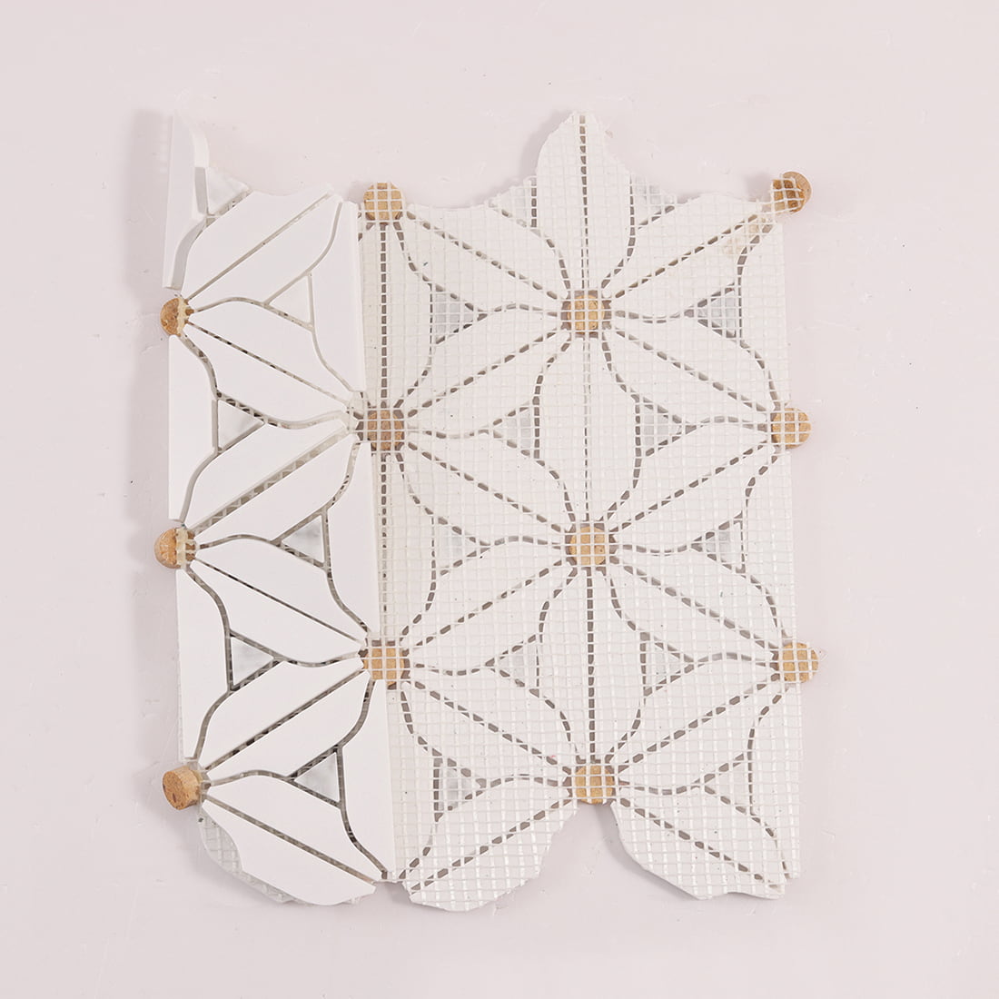 Back view of the mosaic sheet showing mesh backing and pattern layout