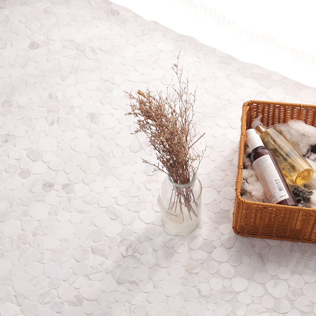 nstalled white pebble marble mosaic tile floor with decor styling