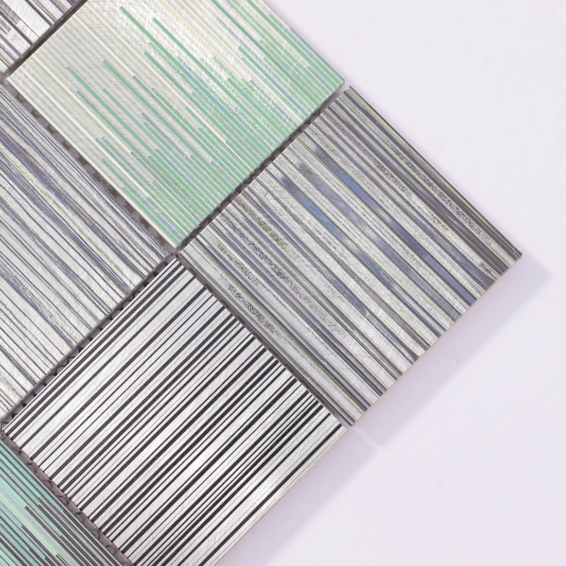 Close-up detail of abstract barcode square aluminum mosaic tile corner