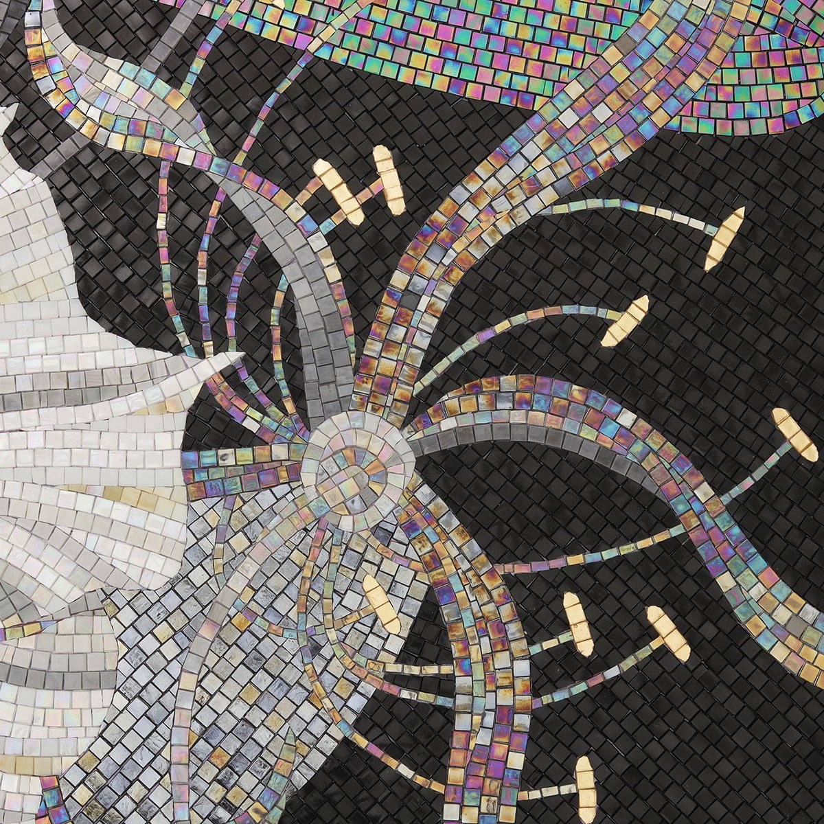 Abstract floral mosaic design with metallic accents on a black background.