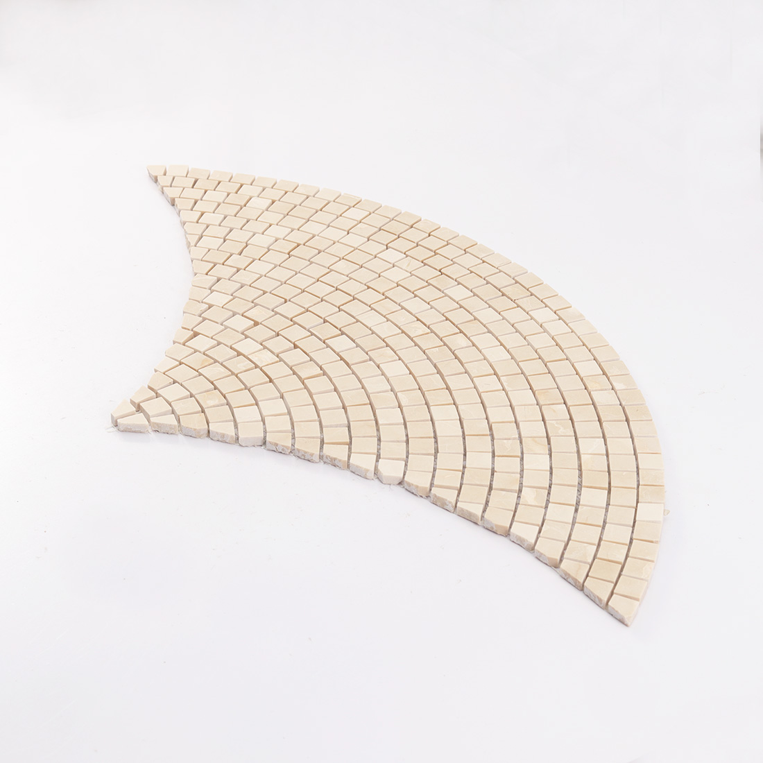 Angled view of beige marble fan-shaped square mosaic sheet