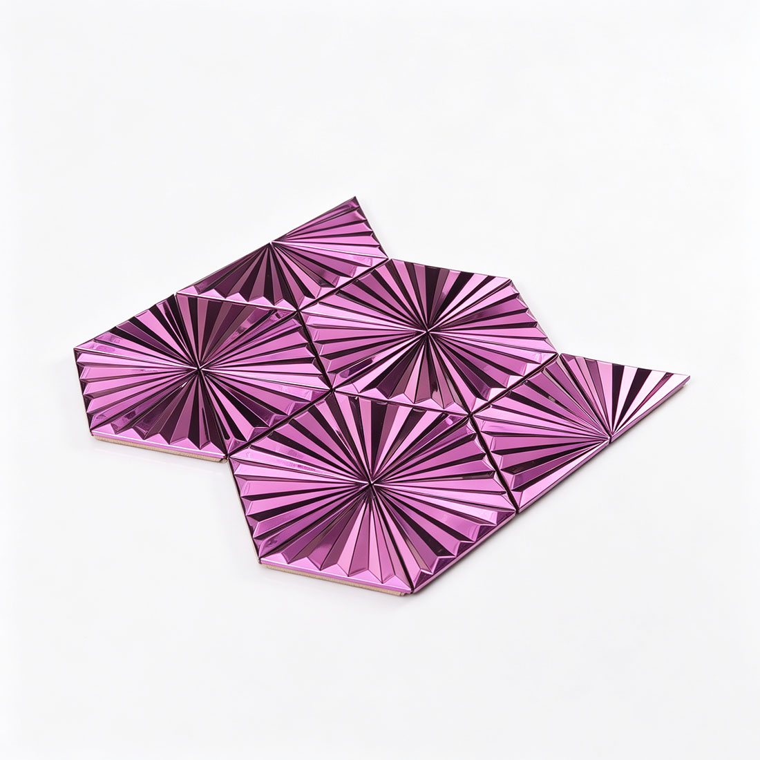 Angled display of fuchsia fan triangle stainless steel mosaic tile