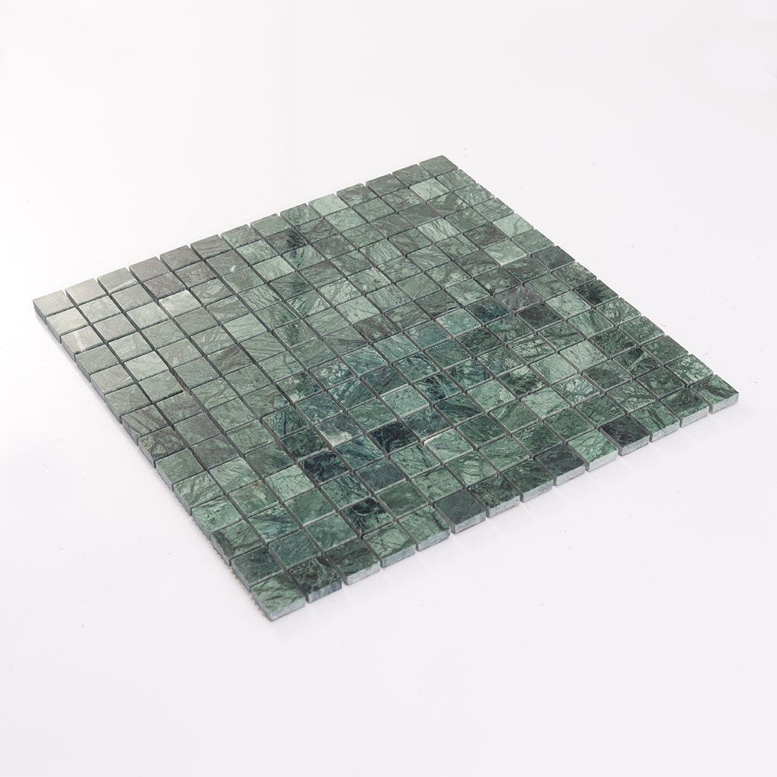 Angled side view of green square marble mosaic tile with raised stone chips