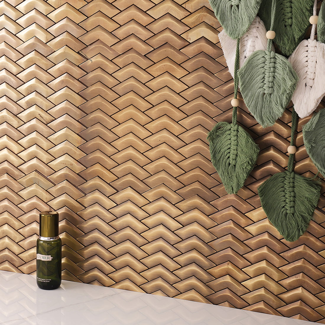 Interior wall scene with antique brass chevron metal mosaic tile