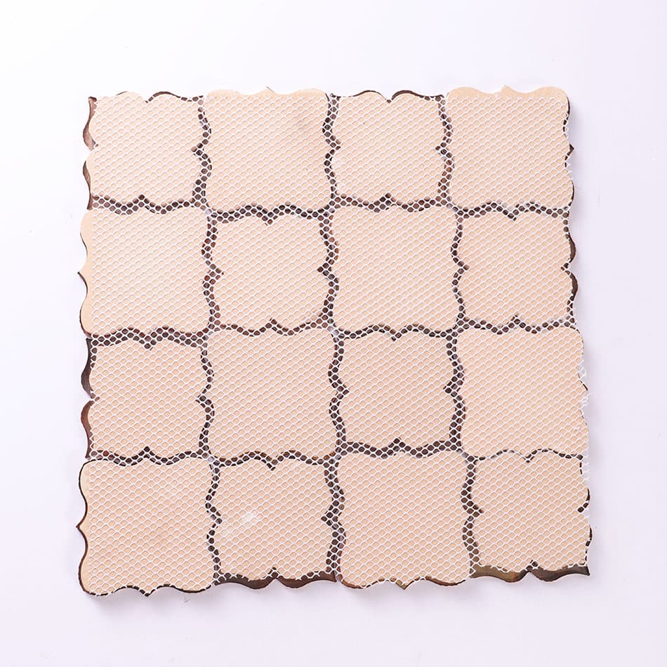 Back view of antique copper arabesque mosaic tile with mesh backing