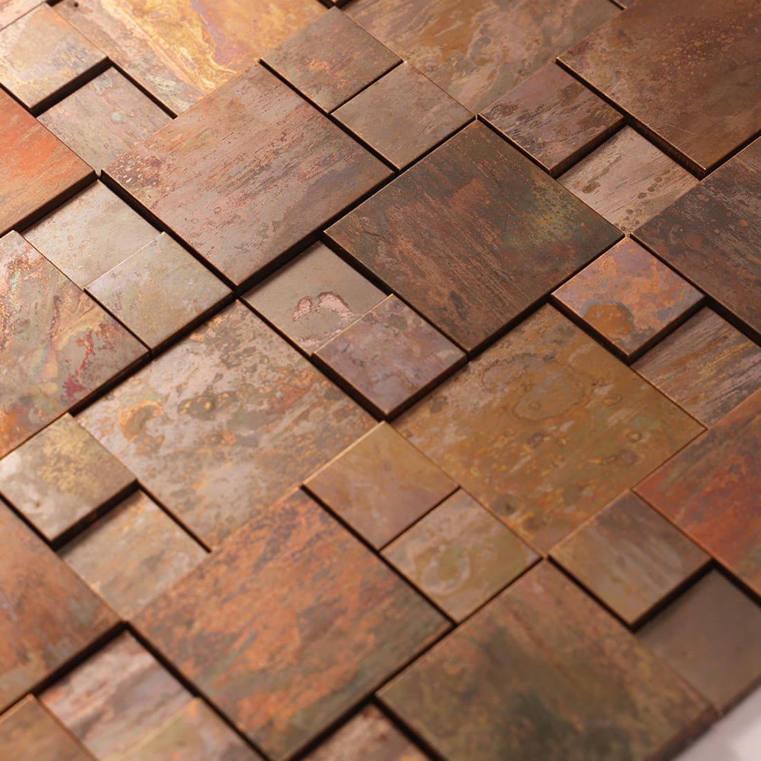 Close-up of antique copper mixed rectangle metal mosaic surface