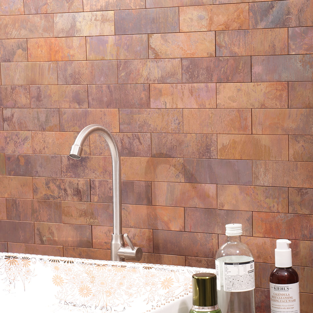 Antique copper rectangular metal mosaic tile installed on wall