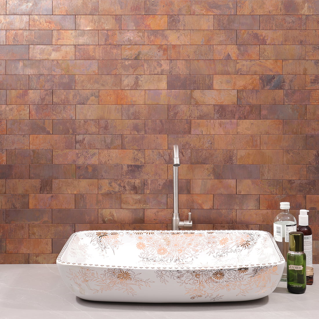 Bathroom wall display of antique copper rectangular metal mosaic tile