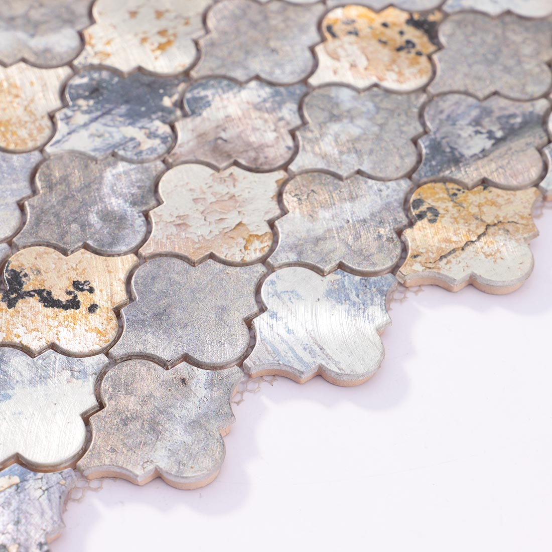 Angle shot of arabesque lantern aluminum mosaic tile showing edge