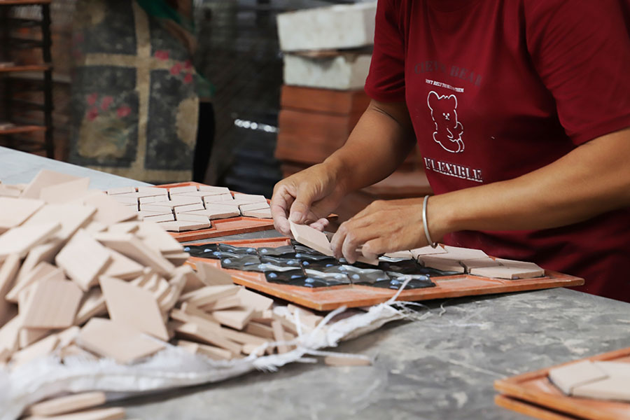 Artisan Handmaking Mosaic Tiles