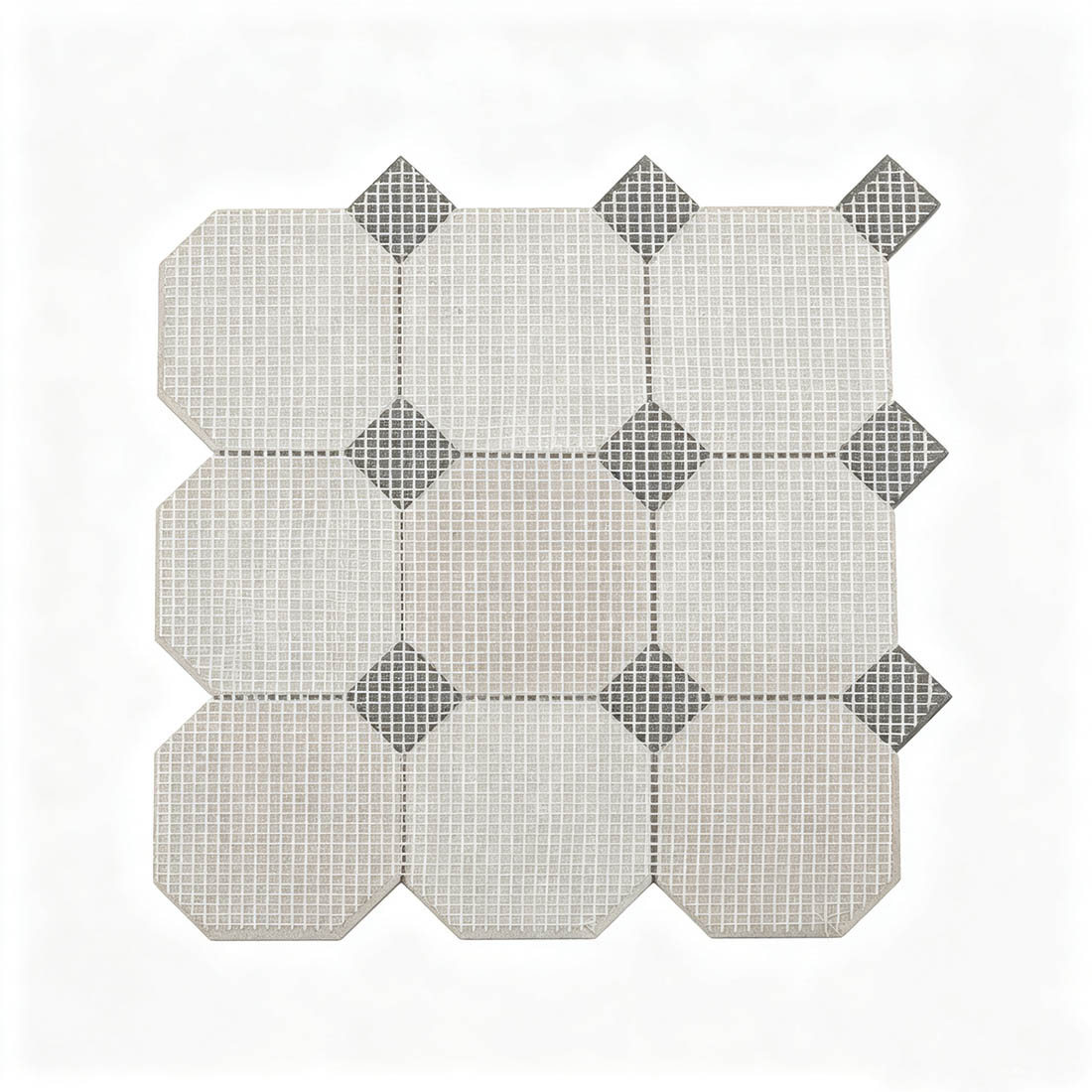 Back mesh backing view of cream black octagon dot marble mosaic