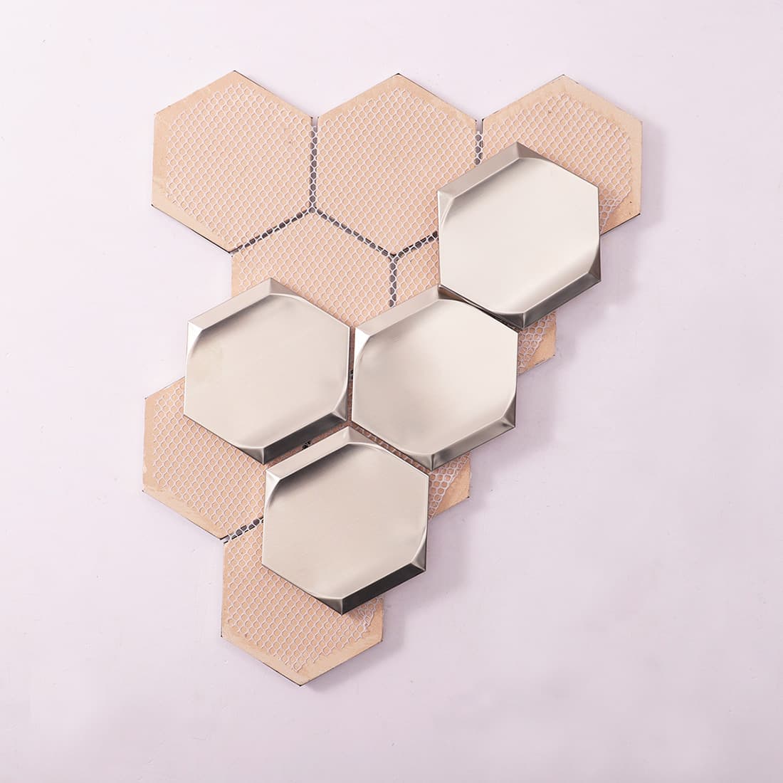 Back mesh view of silver brushed hexagon stainless steel mosaic tile pieces