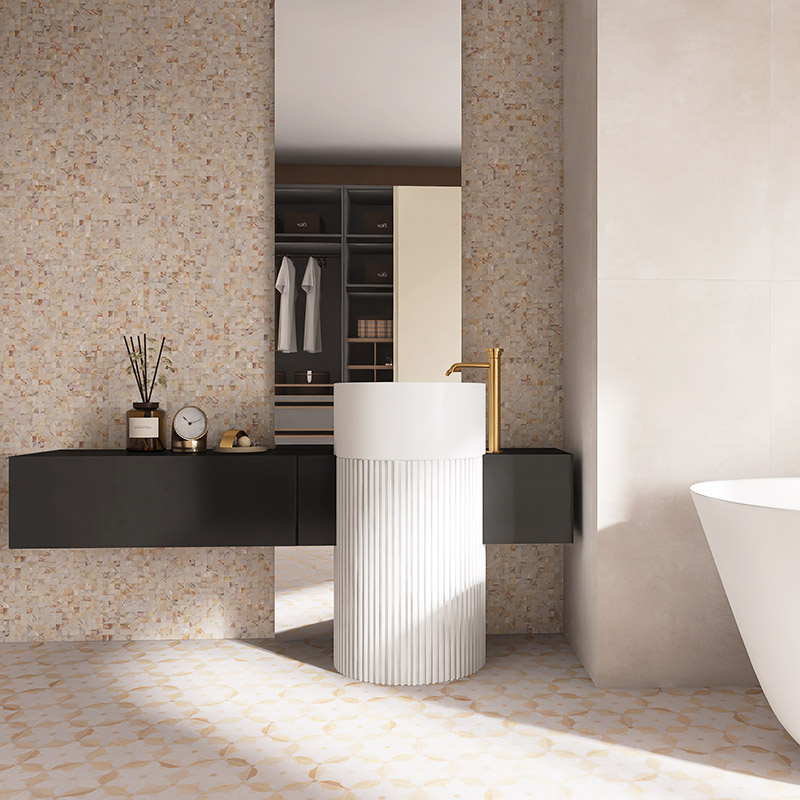 Beige bathroom tiles with mosaic wall, black floating vanity, and white pedestal sink