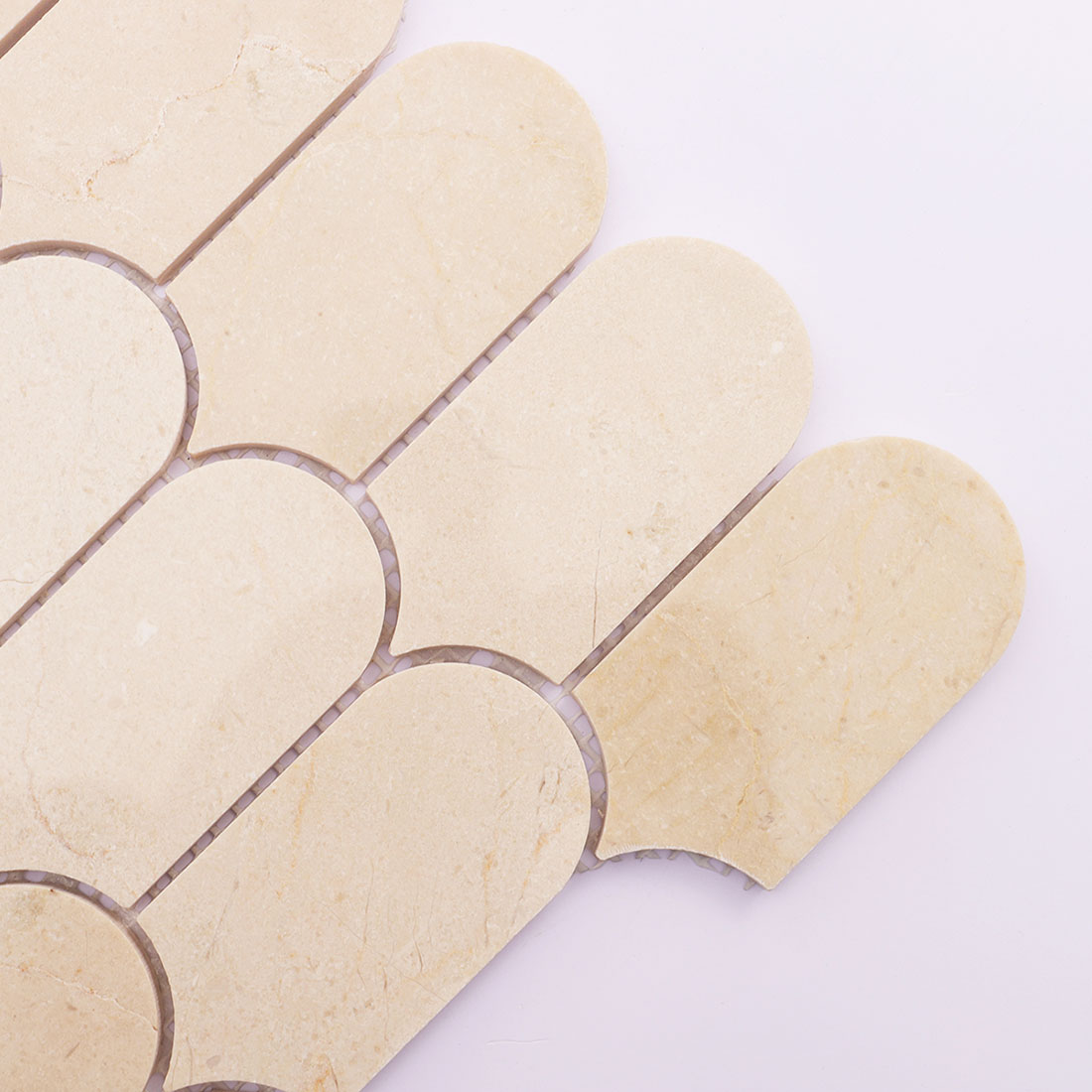 Close up texture detail of natural beige marble mosaic tiles